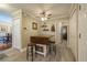 Kitchen island has seating with storage and a ceiling fan that provides both form and function at 17544 Fairmeadow Dr, Tampa, FL 33647