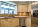 Well-equipped kitchen features stainless steel appliances, granite counters, and ample natural light at 17544 Fairmeadow Dr, Tampa, FL 33647