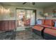 Screened in porch featuring outdoor furniture and view into the home at 17544 Fairmeadow Dr, Tampa, FL 33647