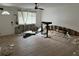 The living room requires repair, including flooring and drywall work, presenting an opportunity for customization at 1878 New Hampshire Ne Ave, St Petersburg, FL 33703