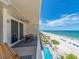 Balcony with seating overlooking the beach and ocean; enjoy the sunset views at 20002 Gulf Blvd # 2803, Indian Shores, FL 33785