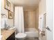 Cozy bathroom showcasing neutral tile, granite countertop, and a tub with shower at 20002 Gulf Blvd # 2803, Indian Shores, FL 33785