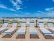 Beachside lounge chairs with direct access to the white sand beach at 20002 Gulf Blvd # 2803, Indian Shores, FL 33785