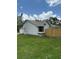 Home with a fenced yard and a bay window, perfect for a cozy reading nook at 23220 Shining Star Dr, Land O Lakes, FL 34639