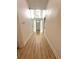 Bright entryway with hardwood floors, creating an elegant and welcoming atmosphere at 23220 Shining Star Dr, Land O Lakes, FL 34639