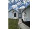 Stylish home exterior enhanced by striking stone design elements and inviting front entrance at 23220 Shining Star Dr, Land O Lakes, FL 34639