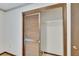 Walk-in closet with wooden sliding doors and wire shelving units, perfect for organization at 3102 E Trapnell Rd, Plant City, FL 33566