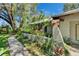 The lush landscaping surrounding this home creates a private oasis at 3102 E Trapnell Rd, Plant City, FL 33566