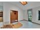 Additional living area with skylight, patterned floors, and natural light at 3102 E Trapnell Rd, Plant City, FL 33566