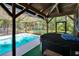 Screened in patio with a private in-ground pool and spa at 3102 E Trapnell Rd, Plant City, FL 33566