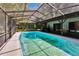 Inviting in-ground pool in screened enclosure with access to the backyard at 3102 E Trapnell Rd, Plant City, FL 33566