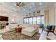 Open concept living area with access to the kitchen, dining area, and screened-in lanai at 4372 Night Star Trl, Odessa, FL 33556