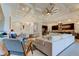 Expansive open-concept area integrates the living space with kitchen and dining, illuminated by modern lighting at 4372 Night Star Trl, Odessa, FL 33556