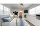 Serene bedroom with ample natural light, ensuite bathroom, and modern decor at 500 62Nd S St, St Petersburg, FL 33707