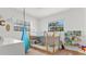 Playful bedroom featuring bunk beds, bright windows, and fun decor at 500 62Nd S St, St Petersburg, FL 33707