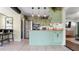 Inviting kitchen featuring stainless steel appliances, wooden countertops, and stylish pendant lighting at 500 62Nd S St, St Petersburg, FL 33707
