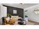 Inviting living room featuring a textured rug, comfortable seating, and stylish decor at 500 62Nd S St, St Petersburg, FL 33707
