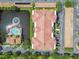 Overhead view of condo building with parking, pond, and pool, providing residents with convenience and recreation at 7903 Seminole Blvd # 2203, Seminole, FL 33772
