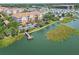 An aerial view of the condo building with a beautiful view of the waterfront at 7903 Seminole Blvd # 2203, Seminole, FL 33772