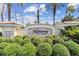 Community entrance sign amid lush landscaping, conveying a sense of exclusivity and tranquility at 7903 Seminole Blvd # 2203, Seminole, FL 33772