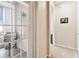 Bright hallway leading to an outdoor balcony and other rooms at 7903 Seminole Blvd # 2203, Seminole, FL 33772