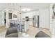 Bright kitchen featuring a breakfast bar with seating, stainless steel appliances, and pendant lighting at 7903 Seminole Blvd # 2203, Seminole, FL 33772