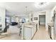 Open concept kitchen flowing into the living area, with a breakfast bar and modern finishes at 7903 Seminole Blvd # 2203, Seminole, FL 33772