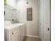 Practical laundry room with a washer, dryer, wire shelving, and a closet for convenient storage solutions at 7903 Seminole Blvd # 2203, Seminole, FL 33772