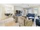 Spacious living area with comfortable seating, large windows and tile flooring, perfect for relaxation and entertaining at 7903 Seminole Blvd # 2203, Seminole, FL 33772