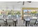 Relaxing pool area with covered seating, ceiling fans, and views of the sparkling pool at 7903 Seminole Blvd # 2203, Seminole, FL 33772