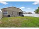 Spacious backyard with a well-maintained lawn and fenced perimeter at 8620 Sandy Plains Dr, Riverview, FL 33578