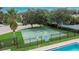 Aerial view of the community basketball court and swimming pool at 8620 Sandy Plains Dr, Riverview, FL 33578