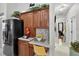 Includes stainless appliances, plenty of cabinetry, counter space, and flows into the dining area at 8620 Sandy Plains Dr, Riverview, FL 33578