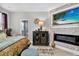 The main bedroom features modern fixtures, a fireplace, and an en suite bathroom at 8620 Sandy Plains Dr, Riverview, FL 33578