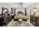 The main bedroom features decorative touches, tile floors, and natural light at 8620 Sandy Plains Dr, Riverview, FL 33578