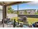 Screened patio featuring seating and a view of the fenced backyard at 8620 Sandy Plains Dr, Riverview, FL 33578