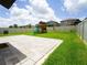 Backyard with a playset, patio, fenced in yard, and green grass at 9650 Sage Creek Dr, Ruskin, FL 33573