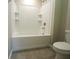 Clean bathroom with a white shower-tub combination and modern fixtures at 9650 Sage Creek Dr, Ruskin, FL 33573
