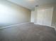Spacious carpeted bedroom with a closet for storage at 9650 Sage Creek Dr, Ruskin, FL 33573