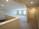 Wide open living room with carpeting, bright neutral paint, ceiling fan, and two windows at 9650 Sage Creek Dr, Ruskin, FL 33573