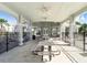 Community pavilion featuring white columns, ceiling fans, and picnic tables at 9650 Sage Creek Dr, Ruskin, FL 33573