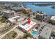 Excellent aerial view of building near the water, inter coastal and community pool at 10280 Gulf Blvd # 12, St Petersburg, FL 33706