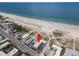 Gorgeous aerial view of a beachside property with beach access and clear ocean waters at 10280 Gulf Blvd # 12, St Petersburg, FL 33706