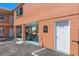 Beachside building featuring covered parking, laundry facilities, beach access, and outdoor seating at 10280 Gulf Blvd # 12, St Petersburg, FL 33706