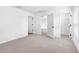 Spacious bedroom with plush carpeting, neutral paint, ample closet space, and great natural light at 10405 Timbercrest Rd, Spring Hill, FL 34608