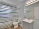 Bathroom featuring a tub with shower and a modern single sink vanity at 1049 Apollo Beach Blvd # D, Apollo Beach, FL 33572