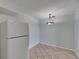 The dining area features tile flooring and a modern lighting fixture at 1049 Apollo Beach Blvd # D, Apollo Beach, FL 33572
