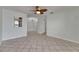 Living area with tile floors, a ceiling fan, and access to other areas of the home at 1049 Apollo Beach Blvd # D, Apollo Beach, FL 33572