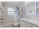 Bathroom featuring patterned tile floors and updated fixtures at 11451 82Nd Ave, Seminole, FL 33772