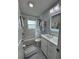 Bathroom featuring patterned tile floors and updated fixtures at 11451 82Nd Ave, Seminole, FL 33772
